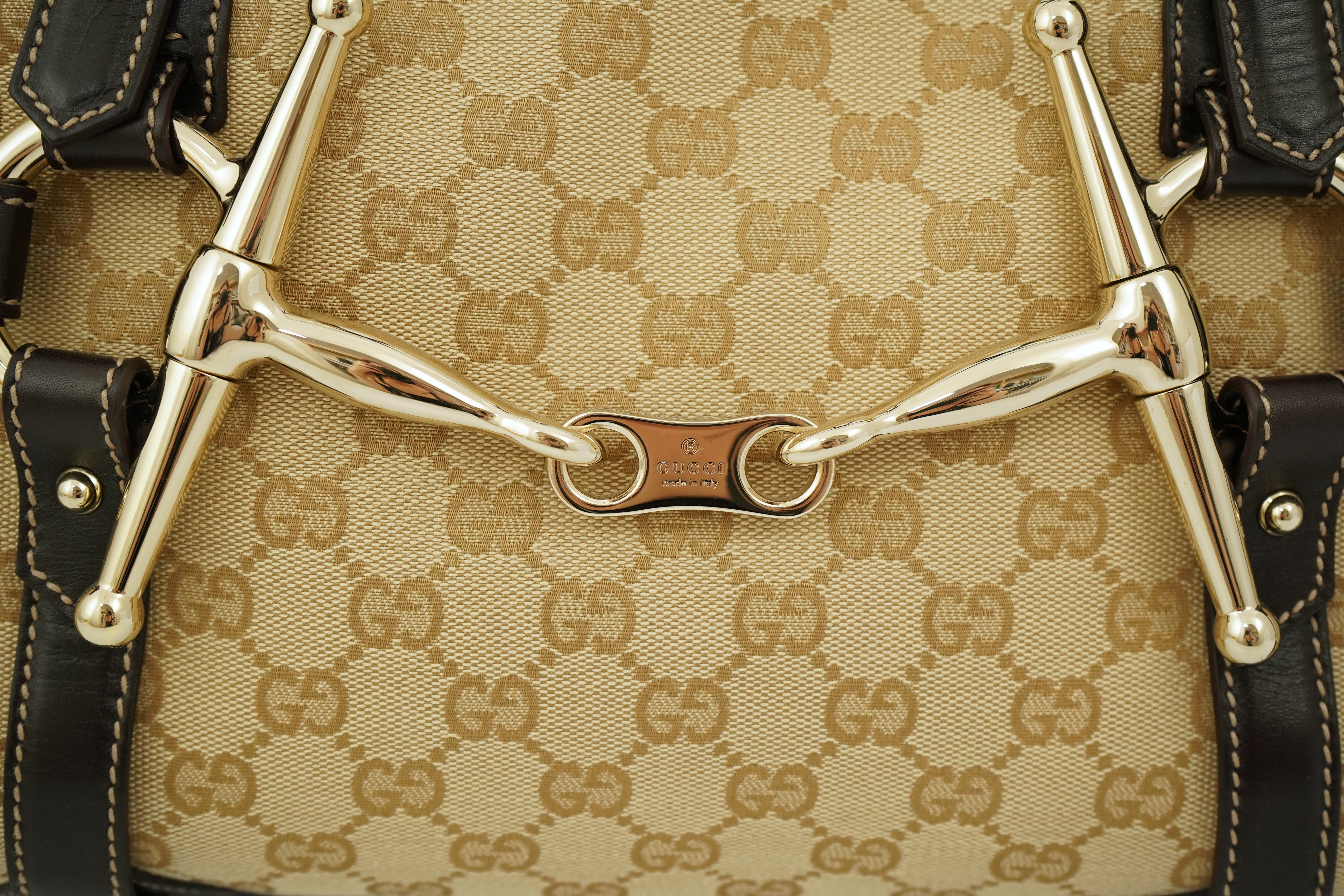 A vintage Gucci GG Classic Monogram Horsebit Shoulder Bag